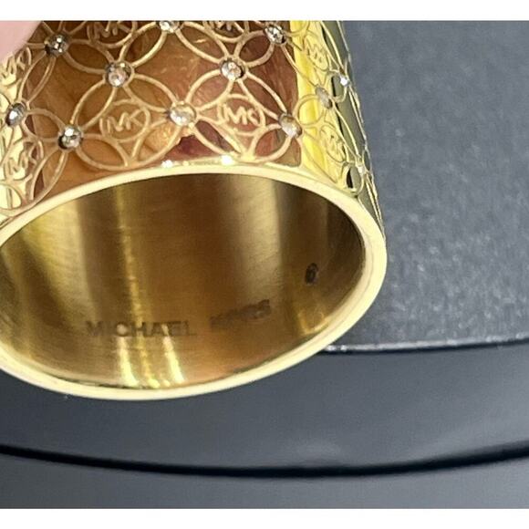 Michael Kors Gold Plated Pave
Monogram Heritage Band Barrel Cigar Ring size 7 - Picture 5 of 10
